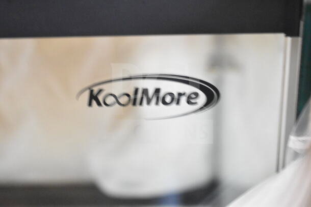 KoolMore dry display case merchandiser with visible brand logo, brand new condition, slight scratches and dents present.