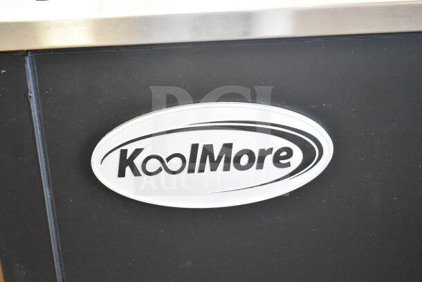 KoolMore KM-BOC65-BK logo on a black commercial bottle cooler with stainless steel trim, brand new condition.