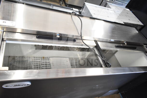 KoolMore KM-BOC65-BK 65 in. commercial bottle cooler, black, built-in opener, 19 cu. ft., new scratch and dent condition.
