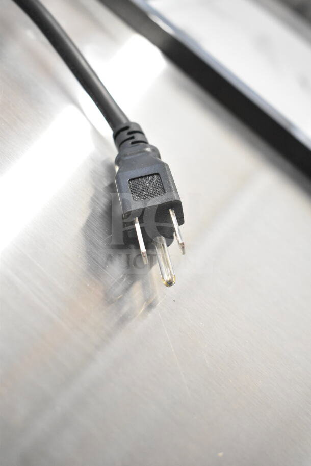 Power cord of a KoolMore KM-BOC65-BK 65 in. commercial bottle cooler, ETL listed, 19 cu. ft., 115 Volts, 1 Phase.