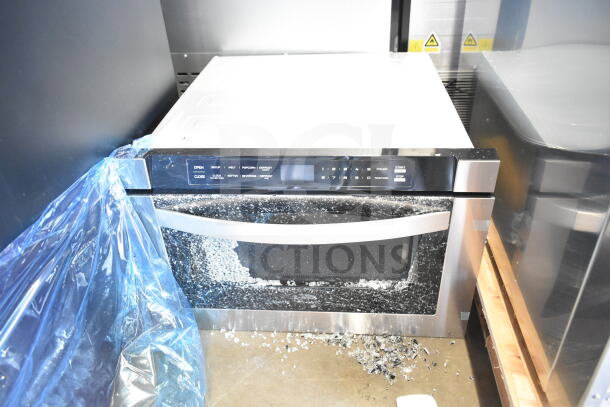 Brand new KoolMore commercial microwave with broken glass and scratches. Control panel intact. Countertop drawer model.