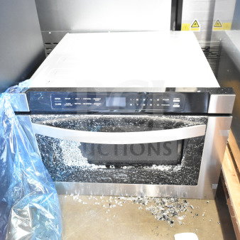 Brand new KoolMore commercial microwave with broken glass and scratches. Control panel intact. Countertop drawer model.