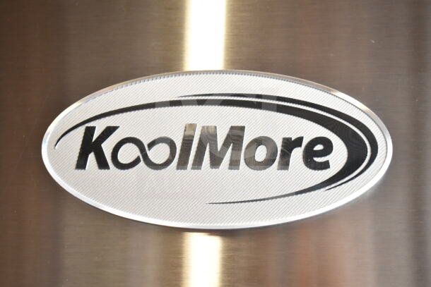KoolMore logo on stainless steel surface of 2024 RIR-3D-SS refrigerator.