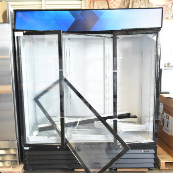 KoolMore Commercial 3 Door Reach In Cooler, new, with visible broken glass on doors, scratch and dent model.
