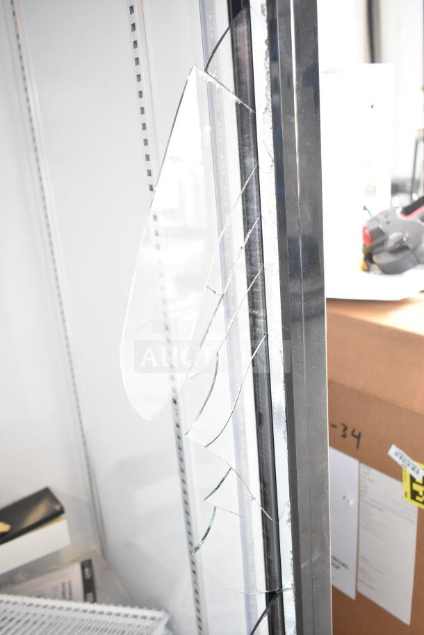KoolMore 3-Door Reach-In Cooler with visible broken glass door panel. Item is new with scratch and dent condition.