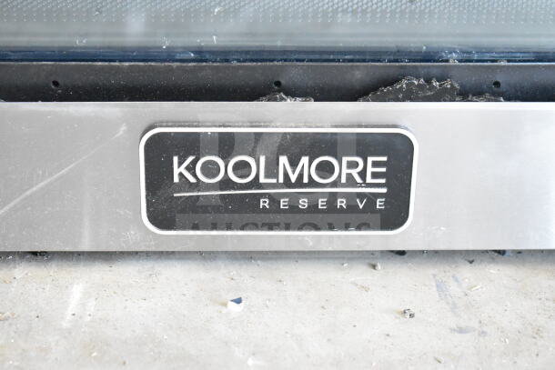 KoolMore drawer microwave oven, brand new with scratches and glass damage. Label shows "KoolMore Reserve." 120 volts, 1 phase.