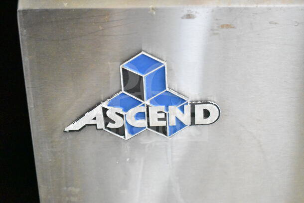 Ascend Jimex JSP-7218 prep table logo, featuring blue cube design. Stainless steel visible, indicating commercial use.