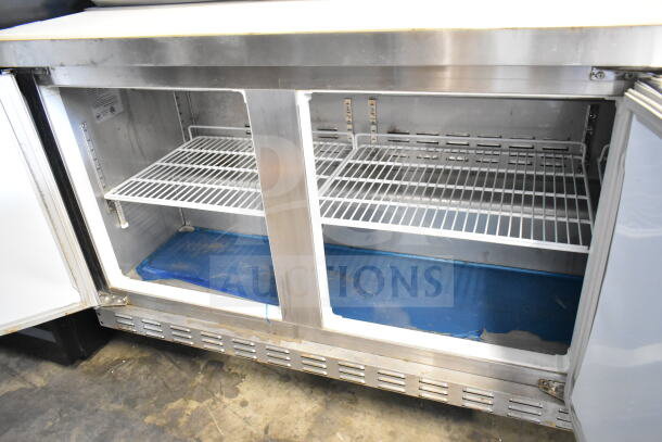 Ascend JSP-7218 commercial sandwich salad prep table, mega top, on casters. Features shelves, 115V, 1 phase.
