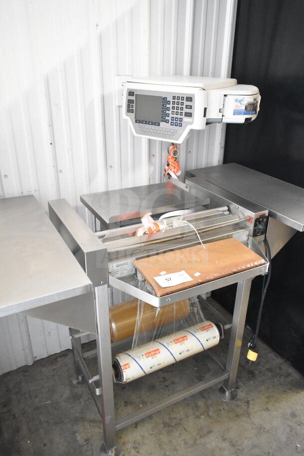 Commercial floor-style wrapping station with Hobart scale and label printer. Features stainless steel construction, 115 volts, 1 phase.