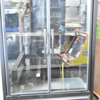 2025 True TVM-48SL-HC commercial 2 Door Reach In Cooler Merchandiser, 115V, 1 Phase, glass doors, black frame.