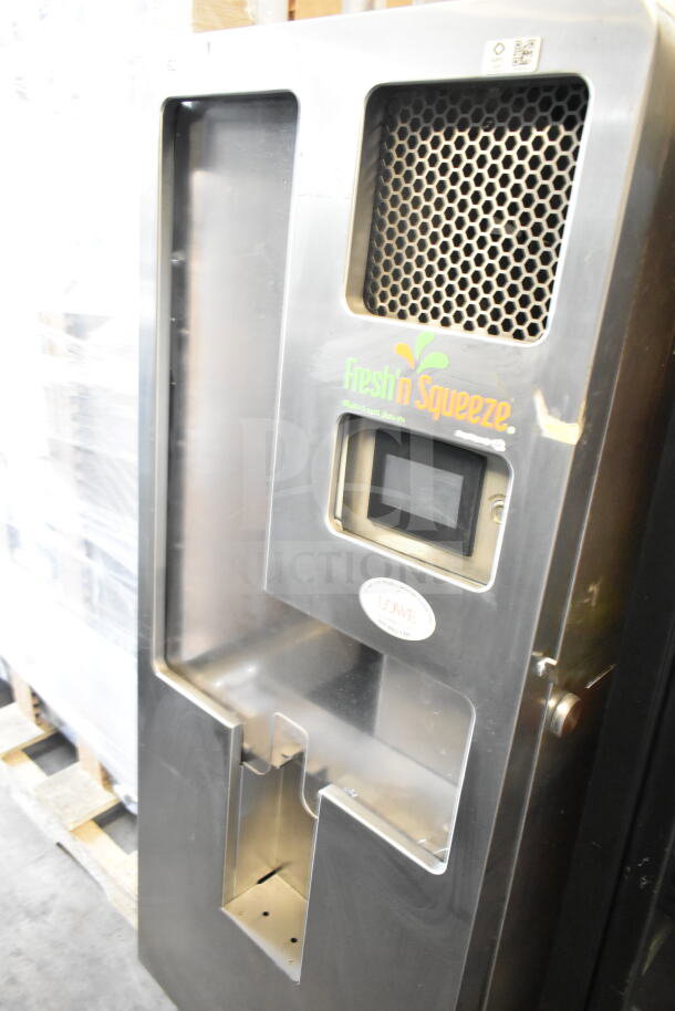 JBT 2ND-GEN-MFJ-HE Fresh N Squeeze floor citrus juicer. Stainless steel, on casters, 115V, 1 phase. Branded panel visible.