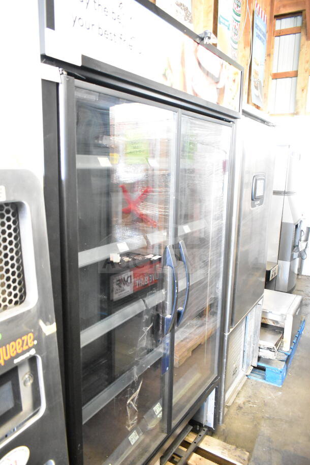 2022 True TVM-48SL-HC Commercial 2 Door Reach In Cooler, clear glass doors, 115 Volts, excellent condition.