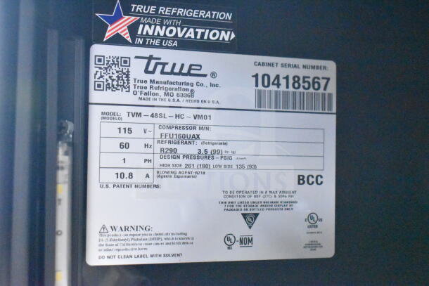 2022 True TVM-48SL-HC Commercial 2 Door Cooler, 115V, 1 Phase, R290 refrigerant; serial 10418567 label visible.
