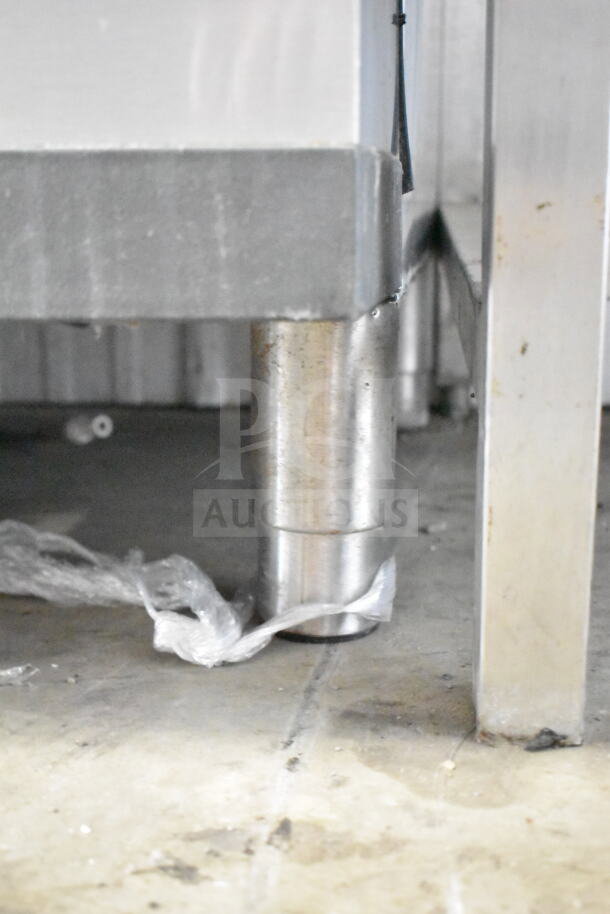 Manitowoc commercial ice head on Manitowoc hotel ice dispenser, stainless steel, sturdy base, used condition.
