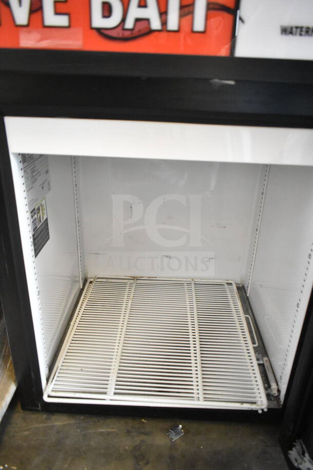 2021 True GDM-05-HC Mini Cooler Merchandiser, 115V, 1 Phase, white interior, grid shelving, visible wear marks inside.
