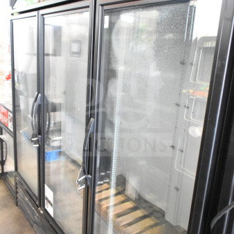 2019 True GDM-72-HC Commercial 3 Door Cooler. Black frame, glass doors, "DAIRY" sign, commercial use, 115V, 1 phase.