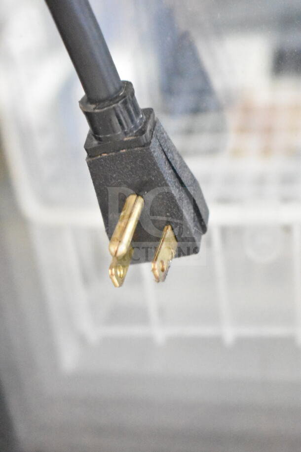Close-up of the power plug for the 2019 True GDM-12F-HC Commercial Freezer, 115V, showing a 1-phase connection.