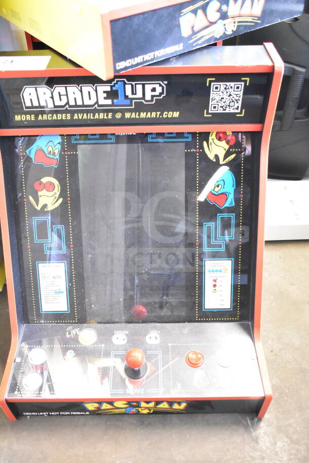 Arcade1up PAC-A-501030 Pac Man Arcade Game, features classic graphics, joystick controls, and functional buttons.