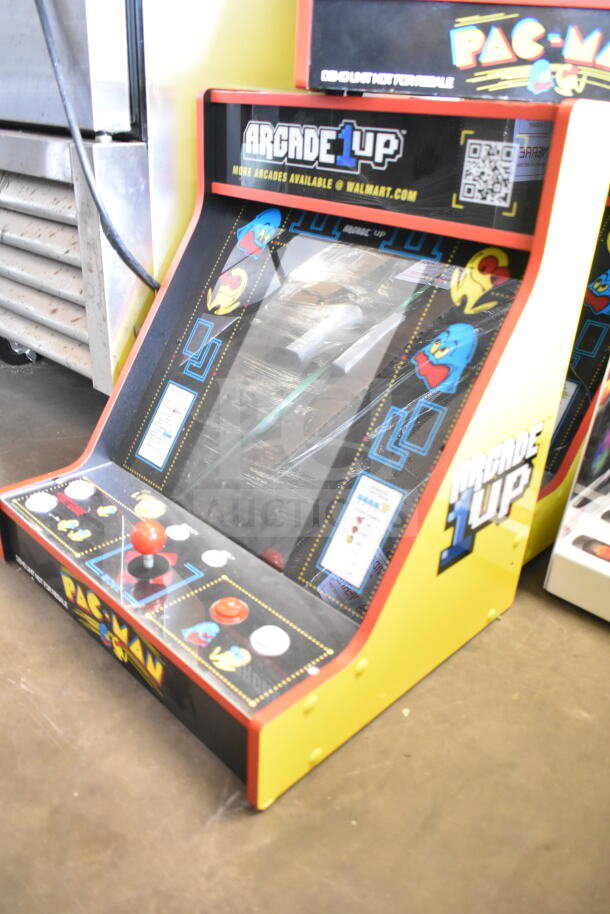 Arcade1up PAC-A-501030 Pac Man Arcade Game, yellow cabinet, joystick, classic graphics, good condition.