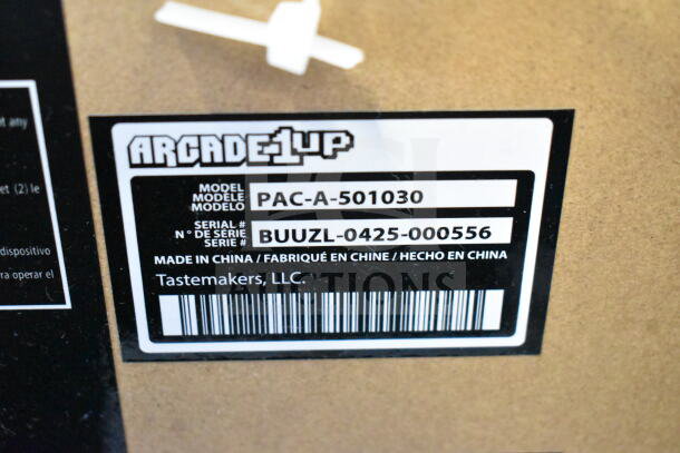 Arcade1up PAC-A-501030 Pac Man arcade game label, serial BUUZL-0425-000556, Made in China by Tastemakers, LLC.