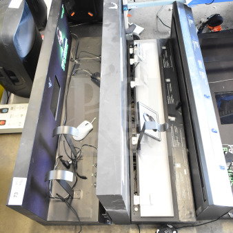 Three store displays featuring computer mice, in used condition with cables. Signs of wear visible.