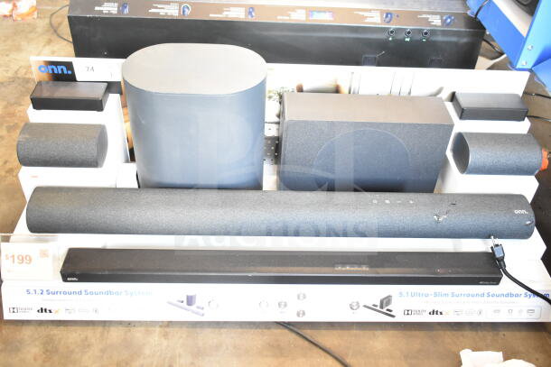 Store display featuring an ONN 5.1.2 surround soundbar system with sound bars and speakers, priced at $199.
