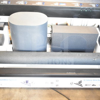 Store display featuring an ONN 5.1.2 surround soundbar system with sound bars and speakers, priced at $199.