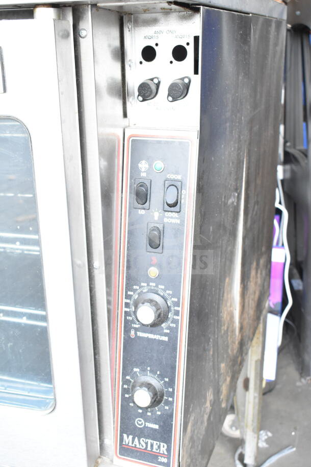 Garland Master 200 commercial convection oven with view-through doors, thermostatic controls, and metal legs.