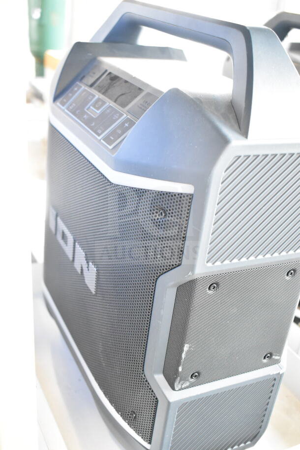 Ion speaker, black with silver accents, integrated controls, sturdy handle, store display condition.