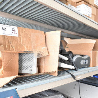 Shelves with 15 items including Sensomatic AMB-9010-IPS, keyboards, Sensormatic ZBSMPCPEF, in boxes, lightly worn.