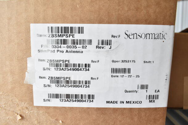 Sensormatic SlimPad Pro Antenna box with labels: Item ZBSMPSPE, P/N 0304-0035-02, S/N 123A2549004734, made in Mexico.
