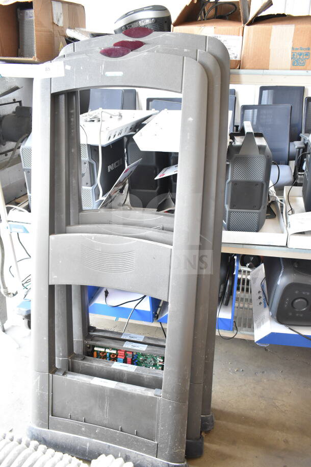 4 Sensormatic UM ADS PMP Anti Theft Scanners, gray, used condition, visible tags and internal component details.