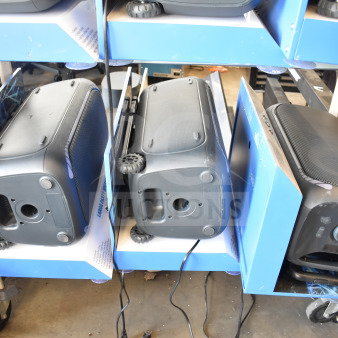 3 Onn large party speakers on store display, each with wheels for portability. New condition, suitable for events.