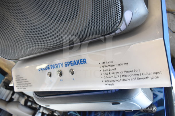 Onn Large Party Speaker with FM radio, IPX4 water-resistant, bass boost, USB port, AUX input, handle, and wheels.
