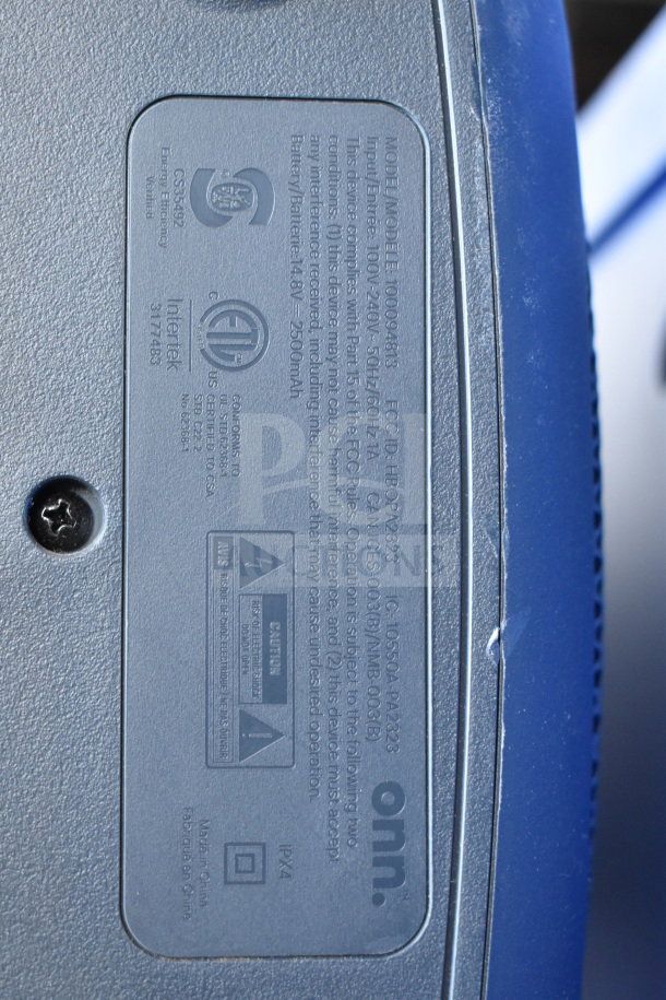 Close-up of Onn large party speaker label; Model 100094818, input 100-240V, 50/60Hz, IPX4, 2500mAh battery.