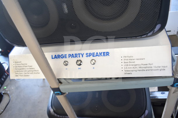 Onn Large Party Speaker display, featuring Bluetooth, 12-hour playtime, 640W power, LED effects, IPX4 water-resistance, and FM radio.