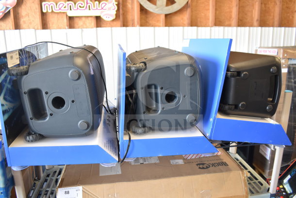 Onn large party speaker store display set, three speakers visible, excellent condition, includes original packaging.