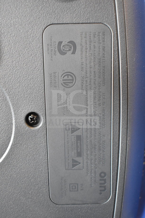 Close-up of the label on an Onn Large Party Speaker model 100008481, showing compliance marks and input details.