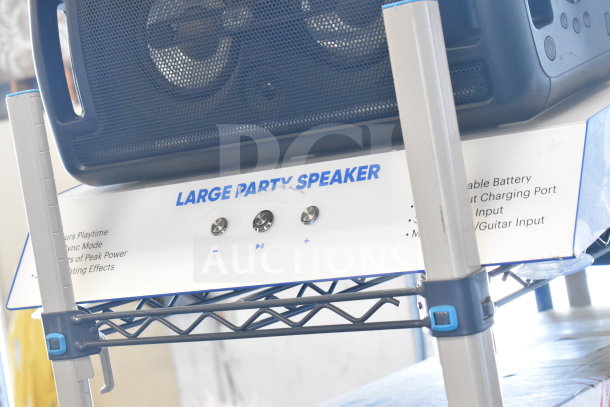 Onn Large Party Speaker display. Notable features: rechargeable battery, USB charging port, mic/guitar input, 22 hrs playtime.