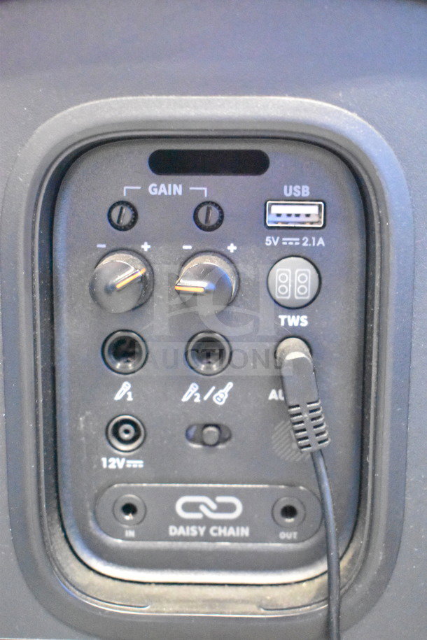 Close-up of JBL PartyBox310 control panel showing gain knobs, USB port labeled "5V 2.1A", and TWS button.