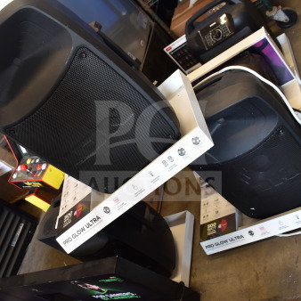3 Ion Pro Glow Ultra Speakers on display stands, excellent condition, prominent labels indicate model and features.