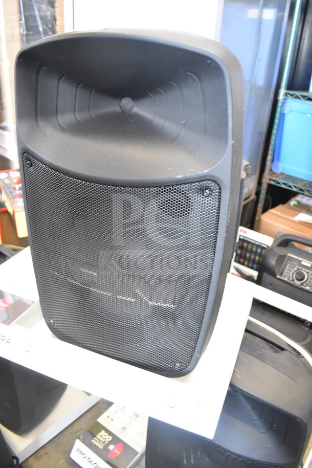 Ion Pro Glow Ultra speaker in store display. Features durable black casing, front grille, and multiple speaker systems. Prominent in-store sale offer visible.