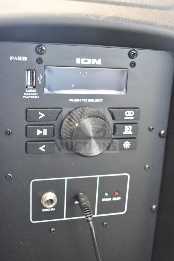 Ion Pro Glow Ultra speaker control panel with USB port, mic input, and function buttons. Model iPA154 visible. Ideal for stores.