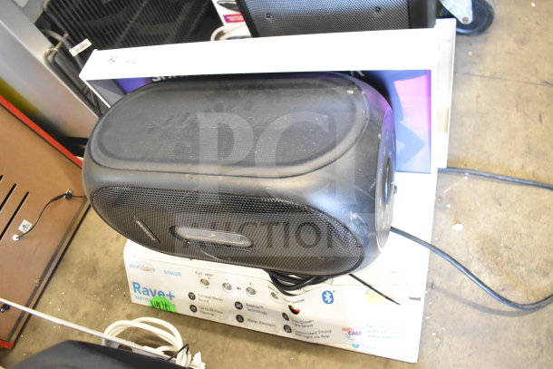 2 store display speakers, including Anker Rave+ and Ion models, both in used condition with original packaging.