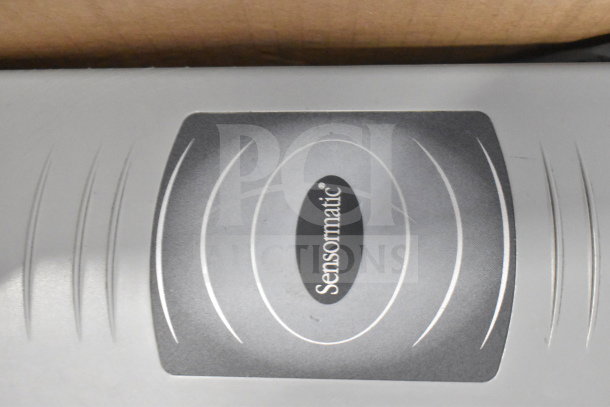 Sensormatic security device, model ZBSMPCPEF, in good condition with branding visible. Part of 8-item auction lot.