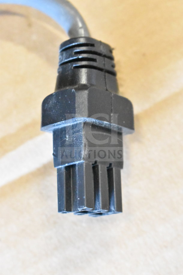 Black Sensormatic connector, part of a lot including ZBSMPCPEF, AMB-9010-IPS, DEAC STP-SD, in used condition.