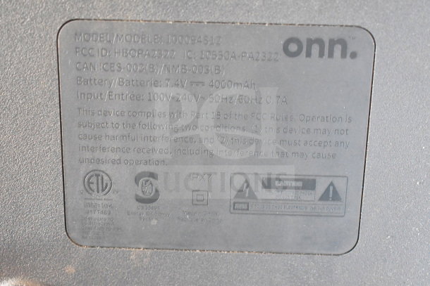 "Onn medium party speaker label, model 100094812, 7.4V 4000mAh battery, IPX7 rating, compatibility details, FCC compliance."