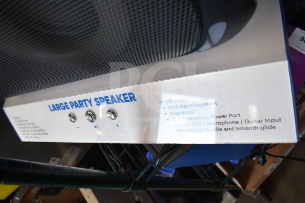 Onn Large Party Speaker display with FM radio, IPX4 water resistance, bass boost, USB port, AUX input, and telescoping handle.