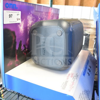 Onn large party speaker on store display shelf, showing model label and price tag.
