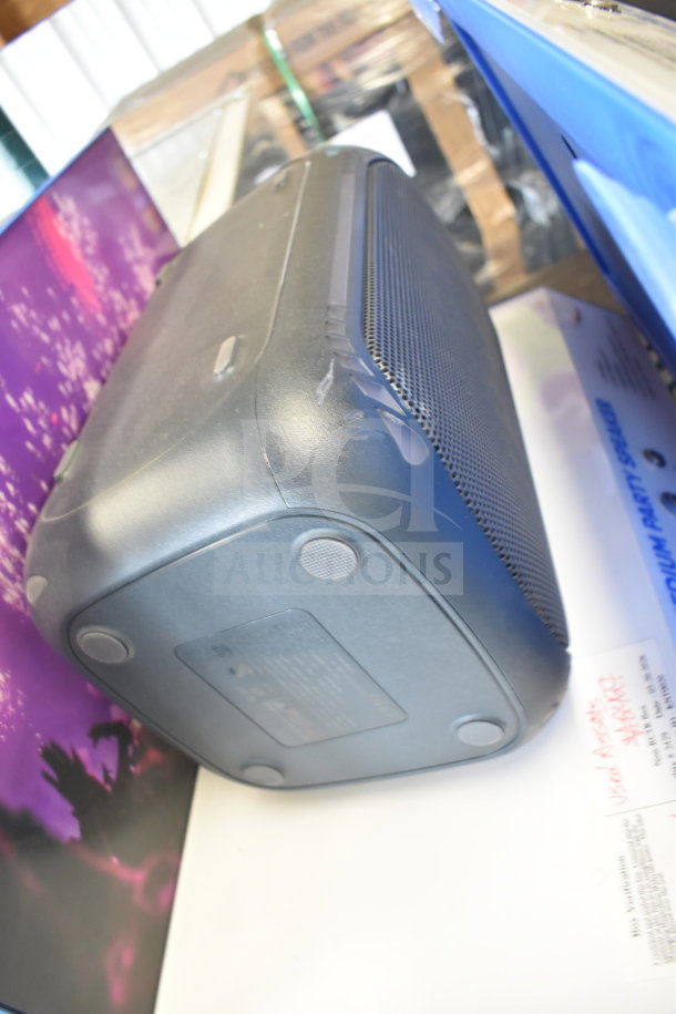 Onn Large Party Speaker, store display condition, featuring powerful audio output. Includes base anti-skid pads.